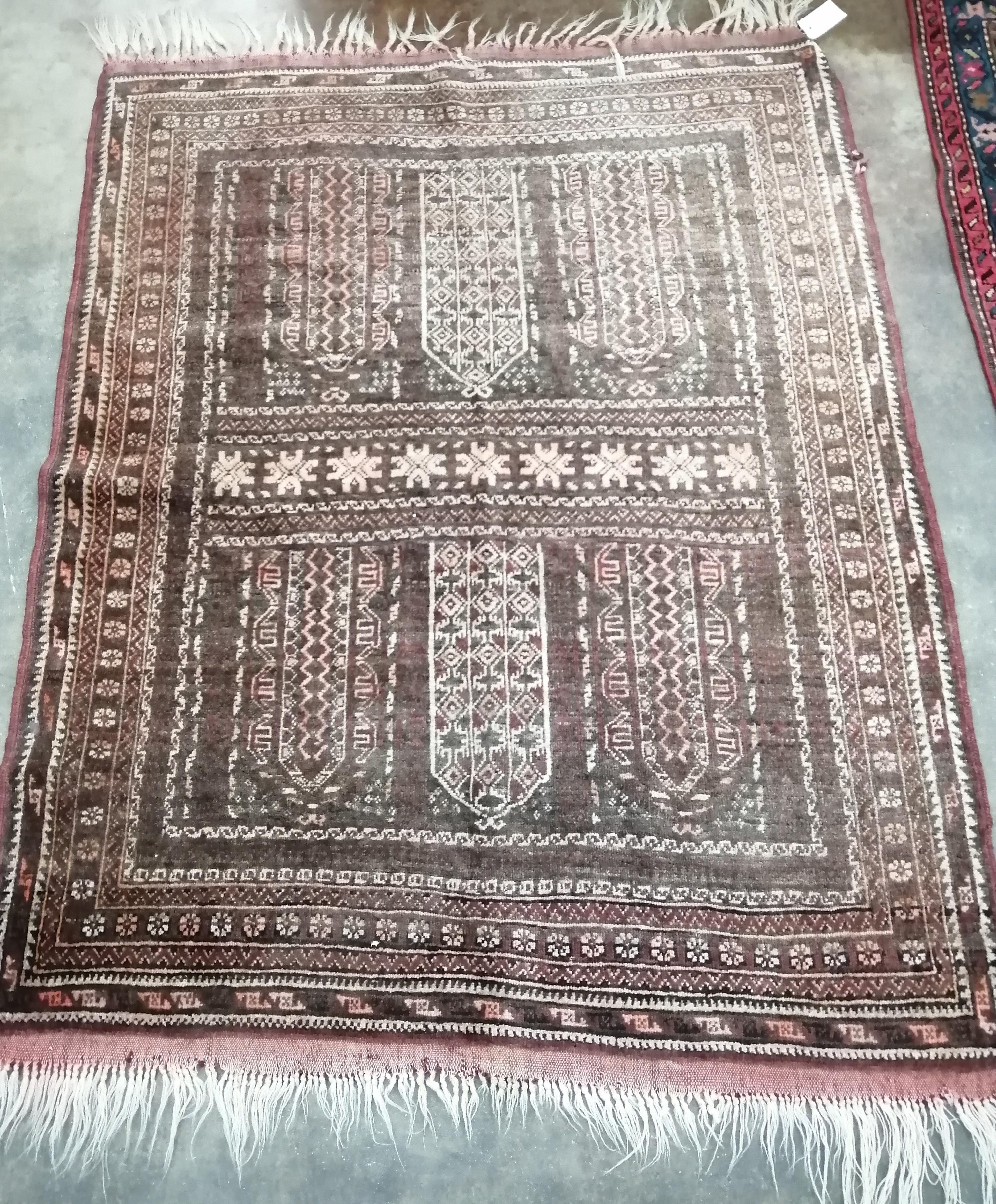 A North West Persian red ground rug, 130 x 104cm